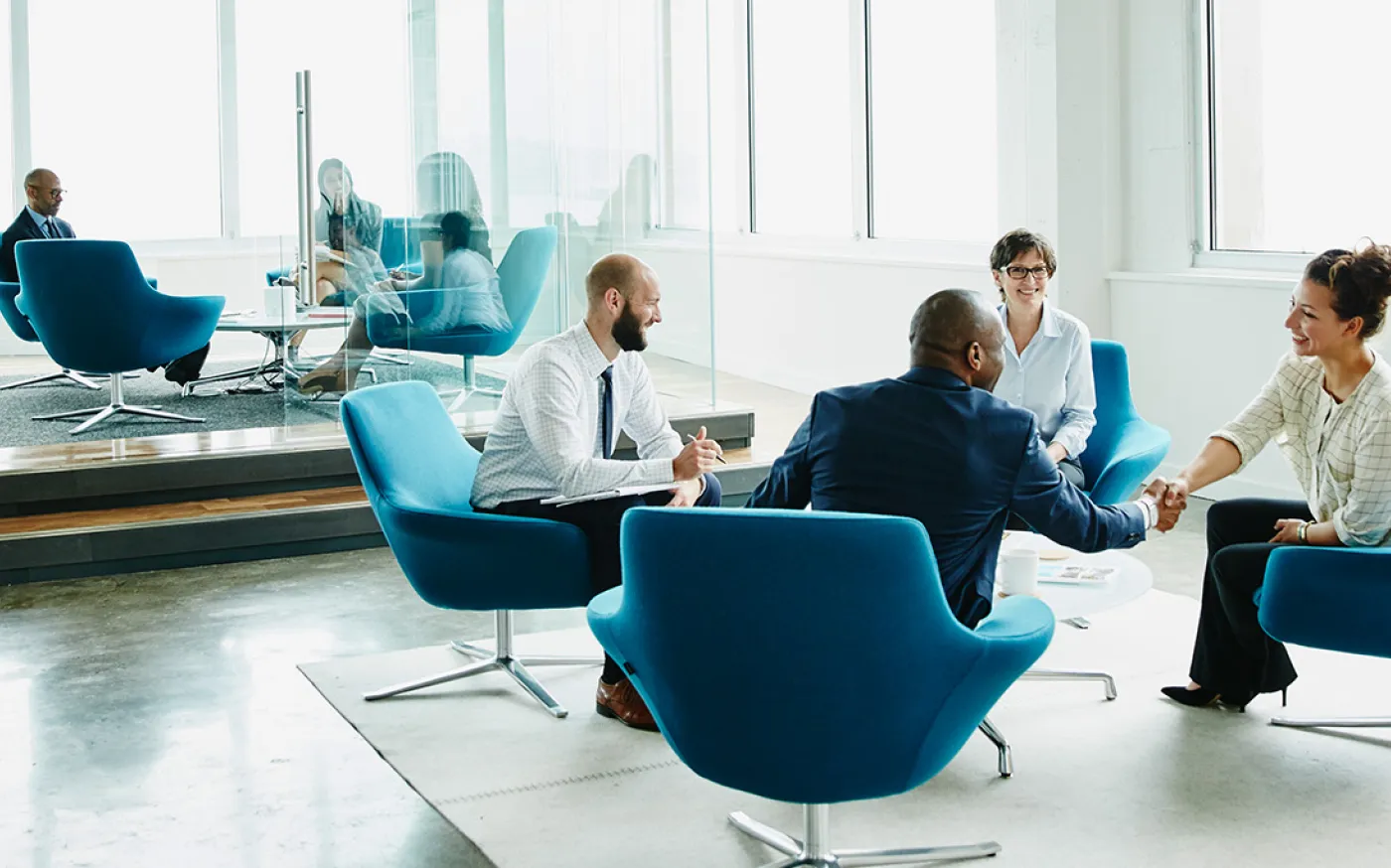 Financial advisors meeting in an office