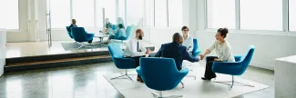 Financial advisors meeting in an office