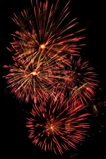 red fireworks by Paul Morley courtesy of Unsplash.